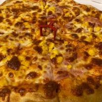 18. Ham and corn pizza