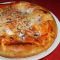18. Sonkás-vegyes gyümölcsös pizza