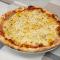 Sonkás-kukoricás pizza