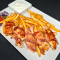Baconbe tekert csirkefalatok sajtmártással