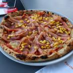 5. Prosciutto e Corn pizza