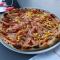 5. Prosciutto e Corn pizza